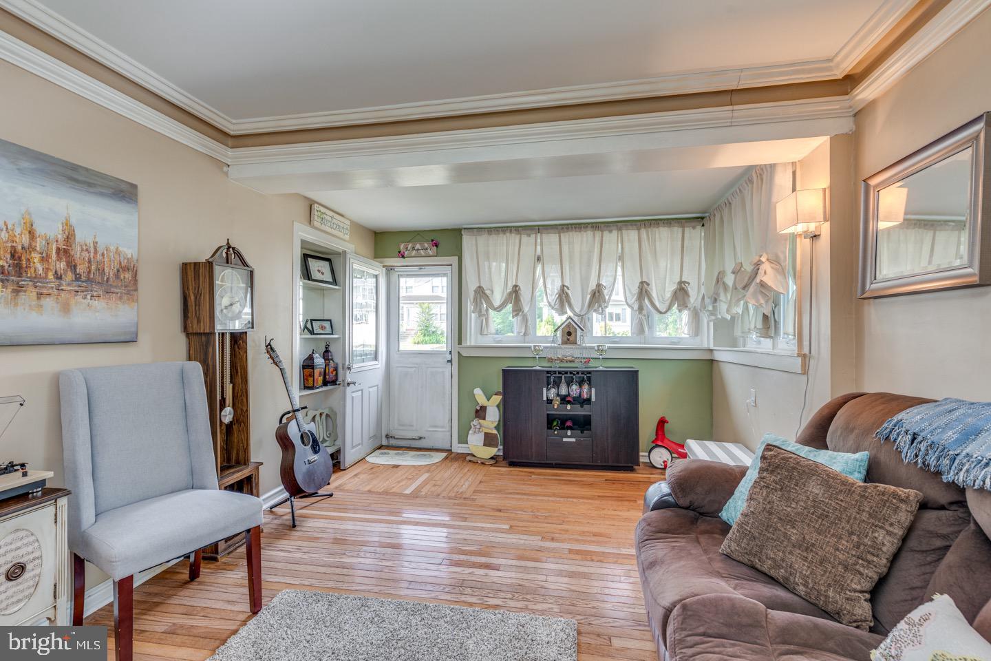 227 South Fellowship Road Maple Shade, NJ 08052 - Photo 7 of 41 a living room with furniture and a fireplace