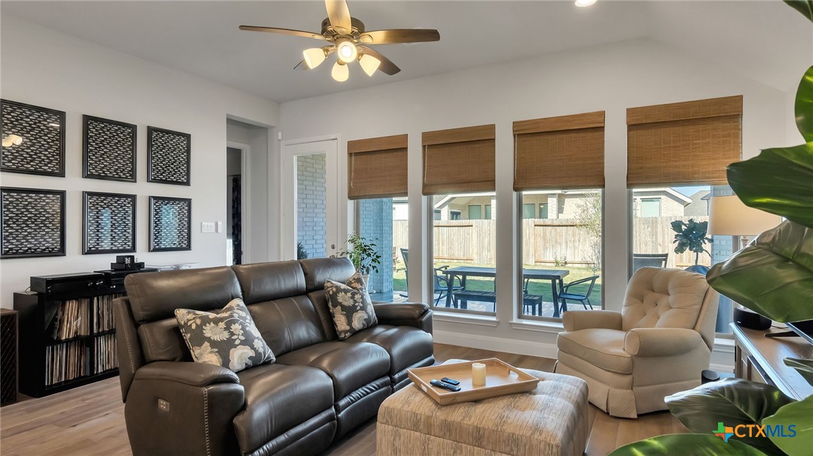 1816 Field Brook Seguin, TX 78155 - Photo 13 of 32 a living room with furniture and a large window