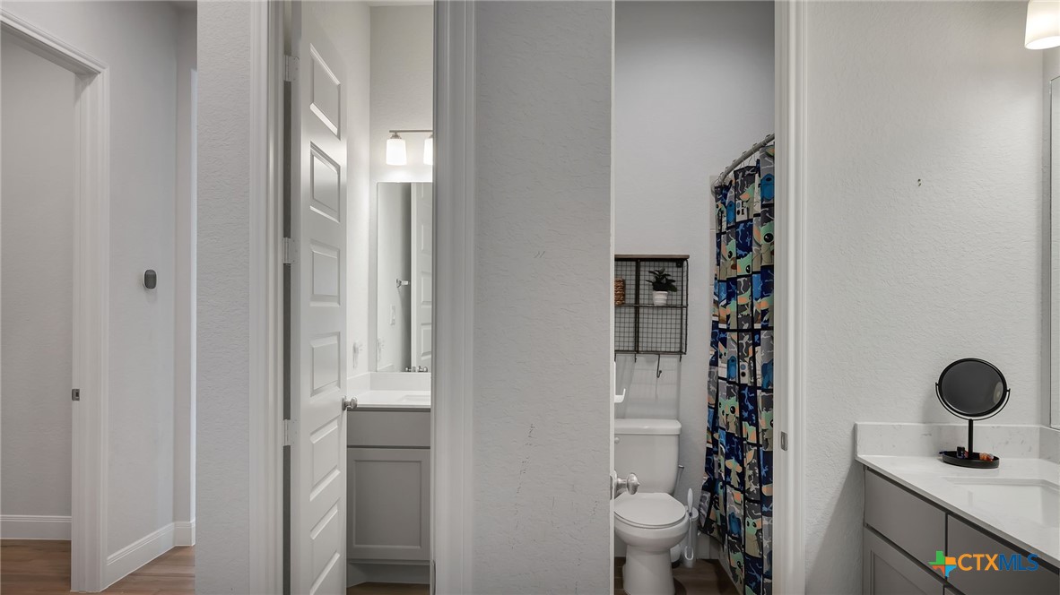 1816 Field Brook Seguin, TX 78155 - Photo 28 of 32 a bathroom with a sink and a toilet