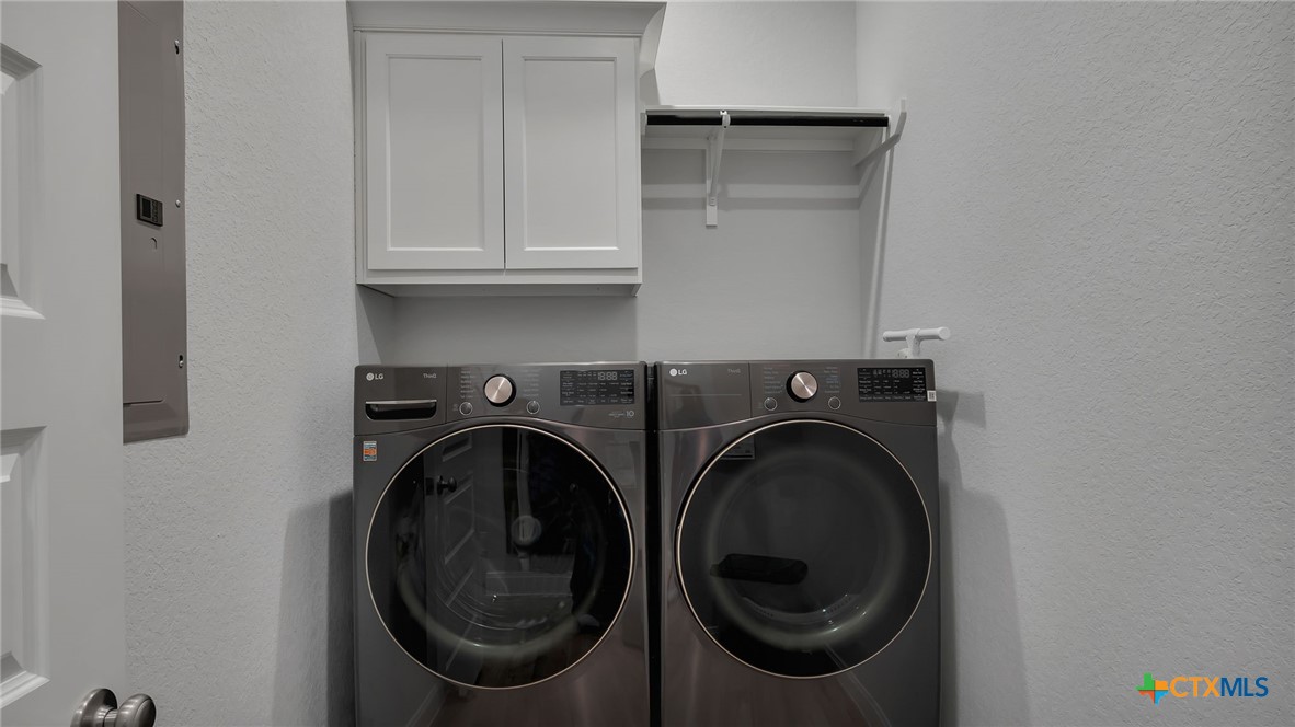 1816 Field Brook Seguin, TX 78155 - Photo 29 of 32 a utility room with dryer and washer