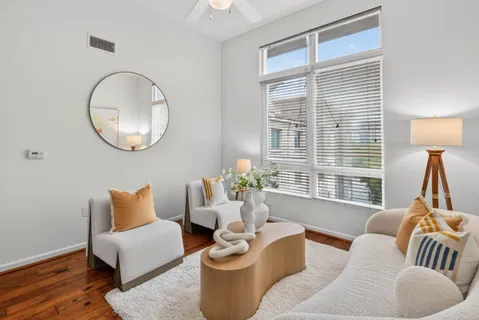 a living room with furniture and window