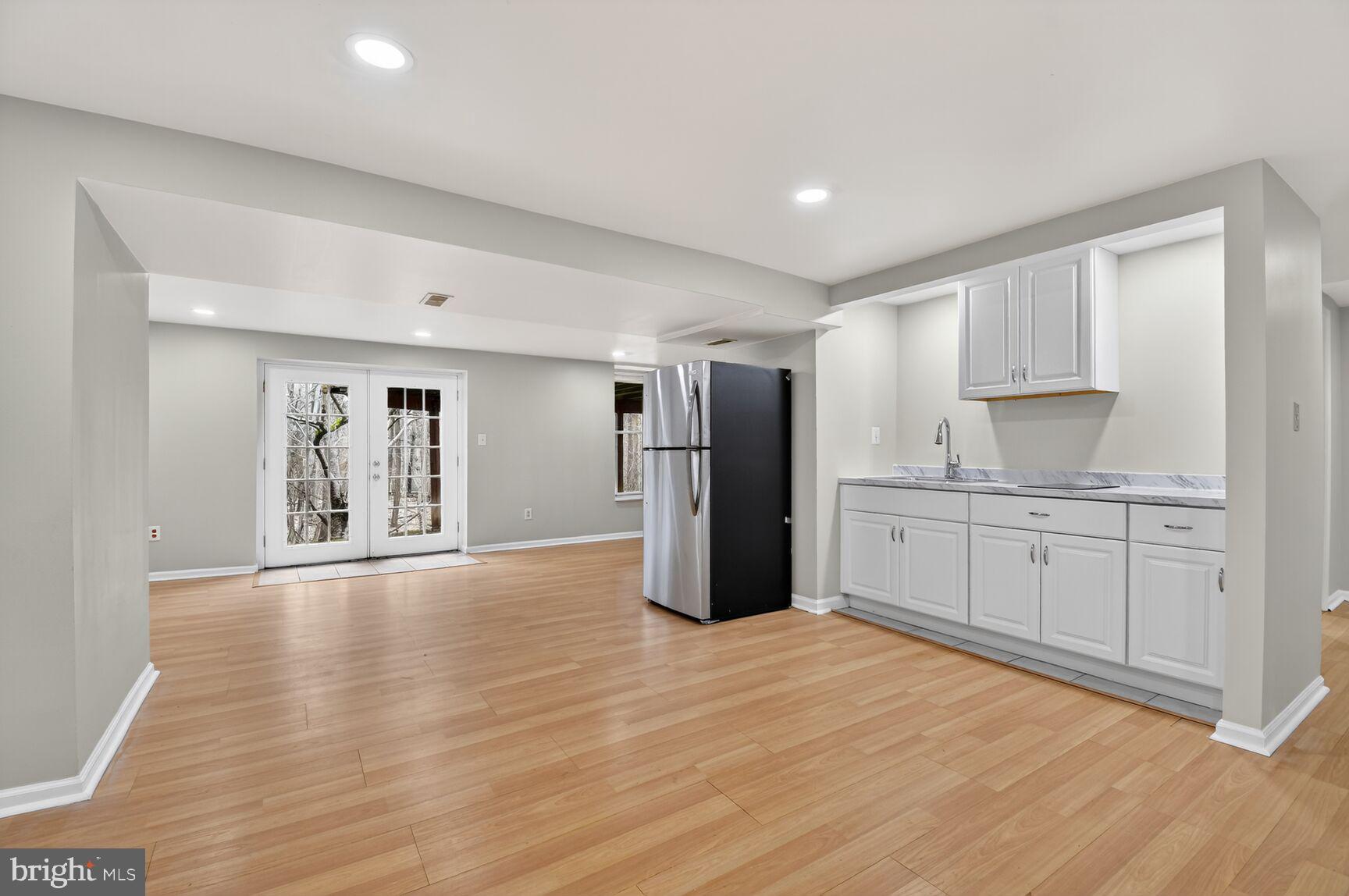 1900 Middlebridge Drive Silver Spring, MD 20906 - Photo 3 of 16 Wood flooring, new appliances, natural light