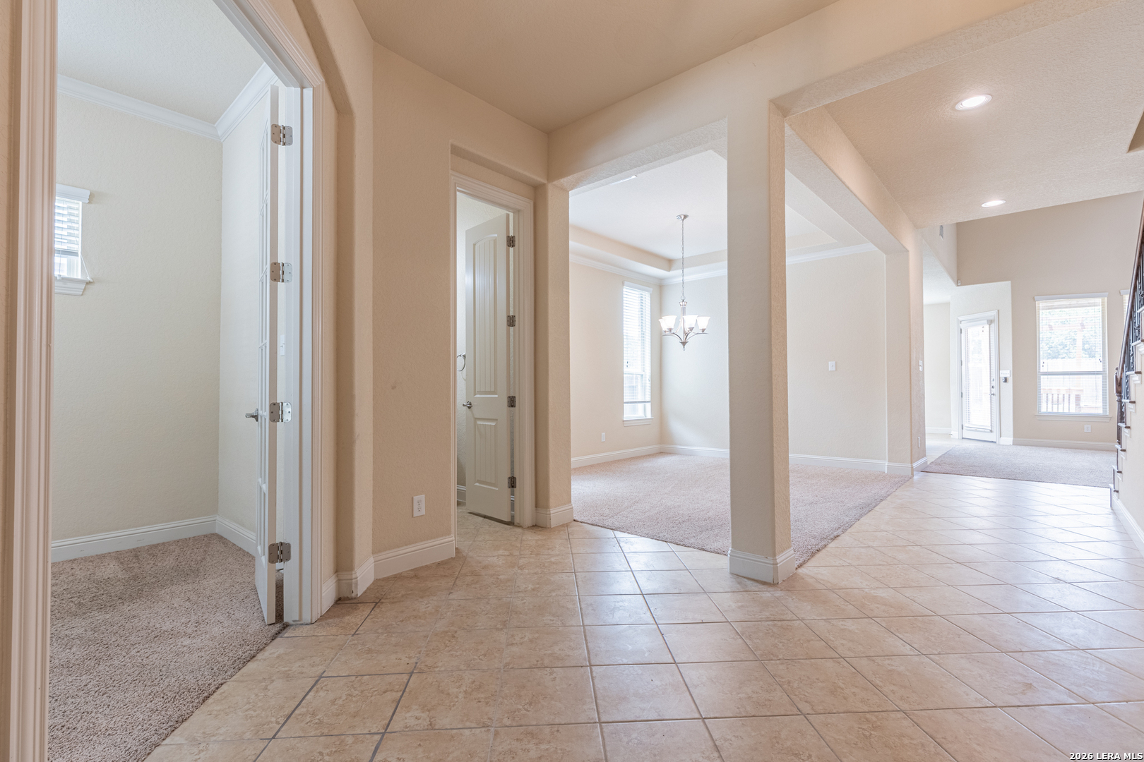 8103 Mystic Chase Boerne, TX 78015 - Photo 3 of 49 a view of a hallway with wooden shelves