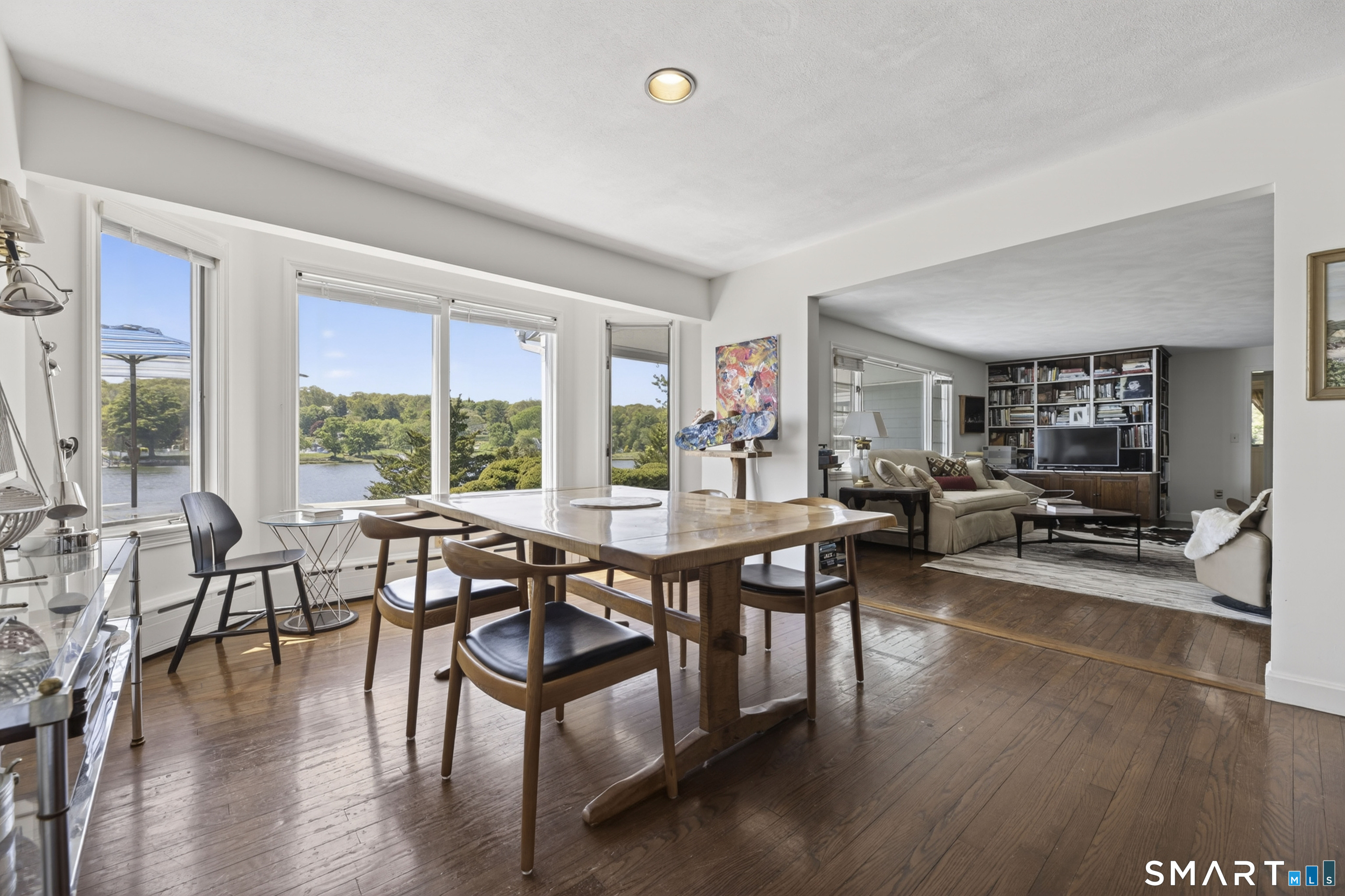 27 Wilbur Road Stonington, CT 06378 - Photo 12 of 40 a view of a dining room with furniture window and wooden floor