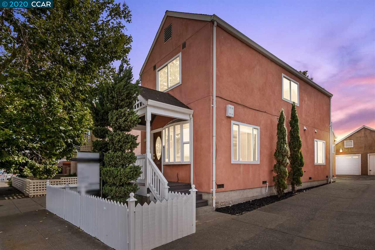 741 10th Street Richmond, CA 94801 - Photo 1 of 1 a front view of a house with a yard
