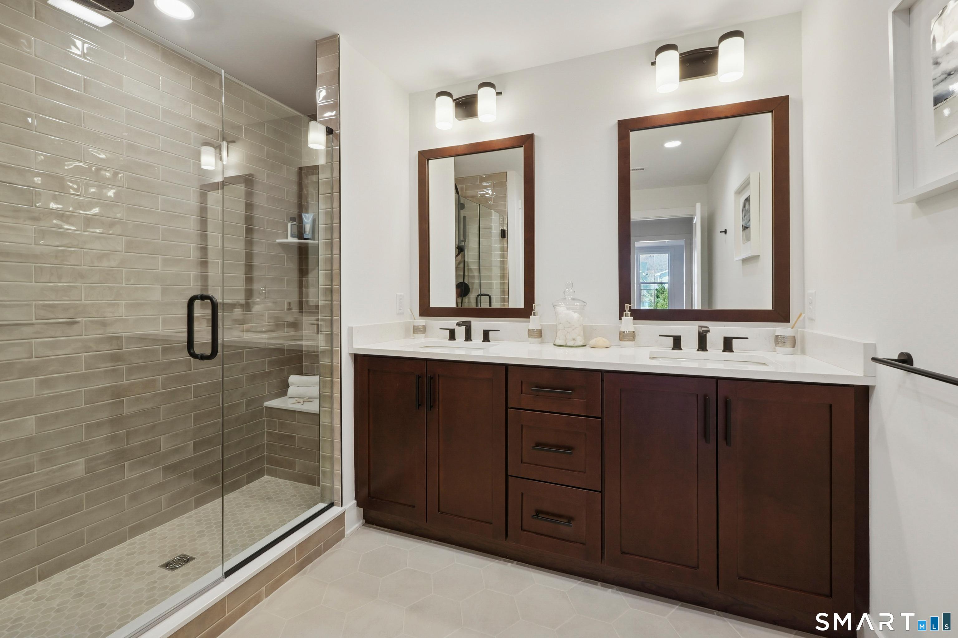 5 Edgewood Way, Unit 25 Woodbridge, CT 06525 - Photo 4 of 8 staged Silliman Modern Farmhouse full ensuite primary bath with double vanity, seated shower and linen closet