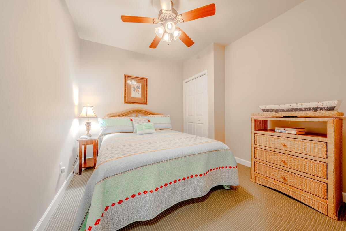 1217 Graves Harbor Trail, Unit 144 Huddleston, VA 24104 - Photo 11 of 30 a bedroom with a bed and a dresser