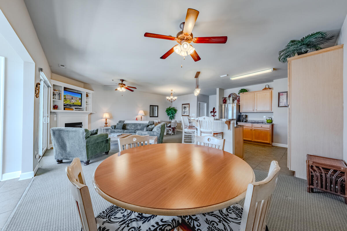 1217 Graves Harbor Trail, Unit 144 Huddleston, VA 24104 - Photo 17 of 30 a view of a dining room with furniture and a chandelier