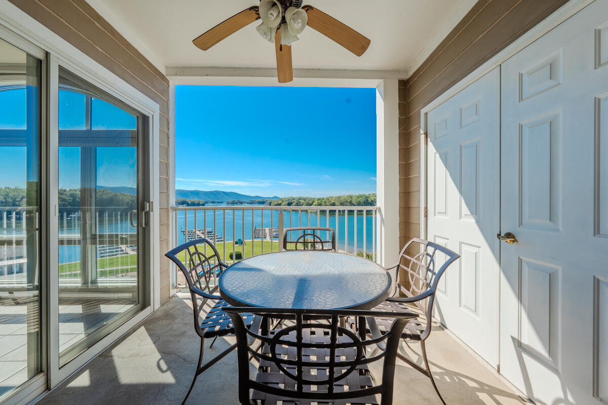 1217 Graves Harbor Trail, Unit 144 Huddleston, VA 24104 - Photo 22 of 30 a view of a dining room with furniture window and wooden floor