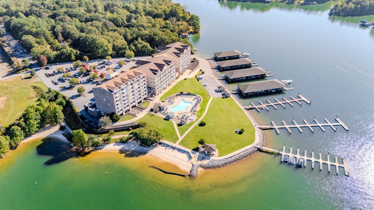 1217 Graves Harbor Trail, Unit 144 Huddleston, VA 24104 - Photo 30 of 30 an aerial view of a house with a garden and lake view