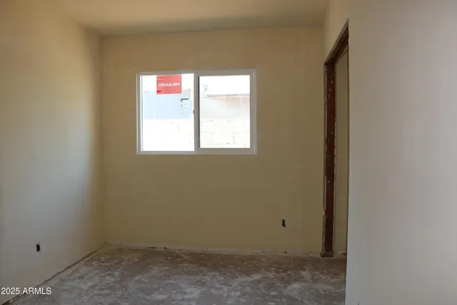 a view of a hallway with closet