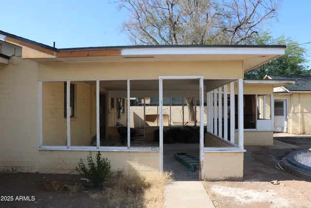 a view of swimming pool with outdoor seating