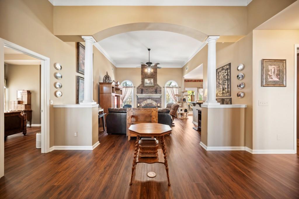 348 Mountain Laurel Walk Canton, GA 30114 - Photo 2 of 26 a living room with furniture and a wooden floor