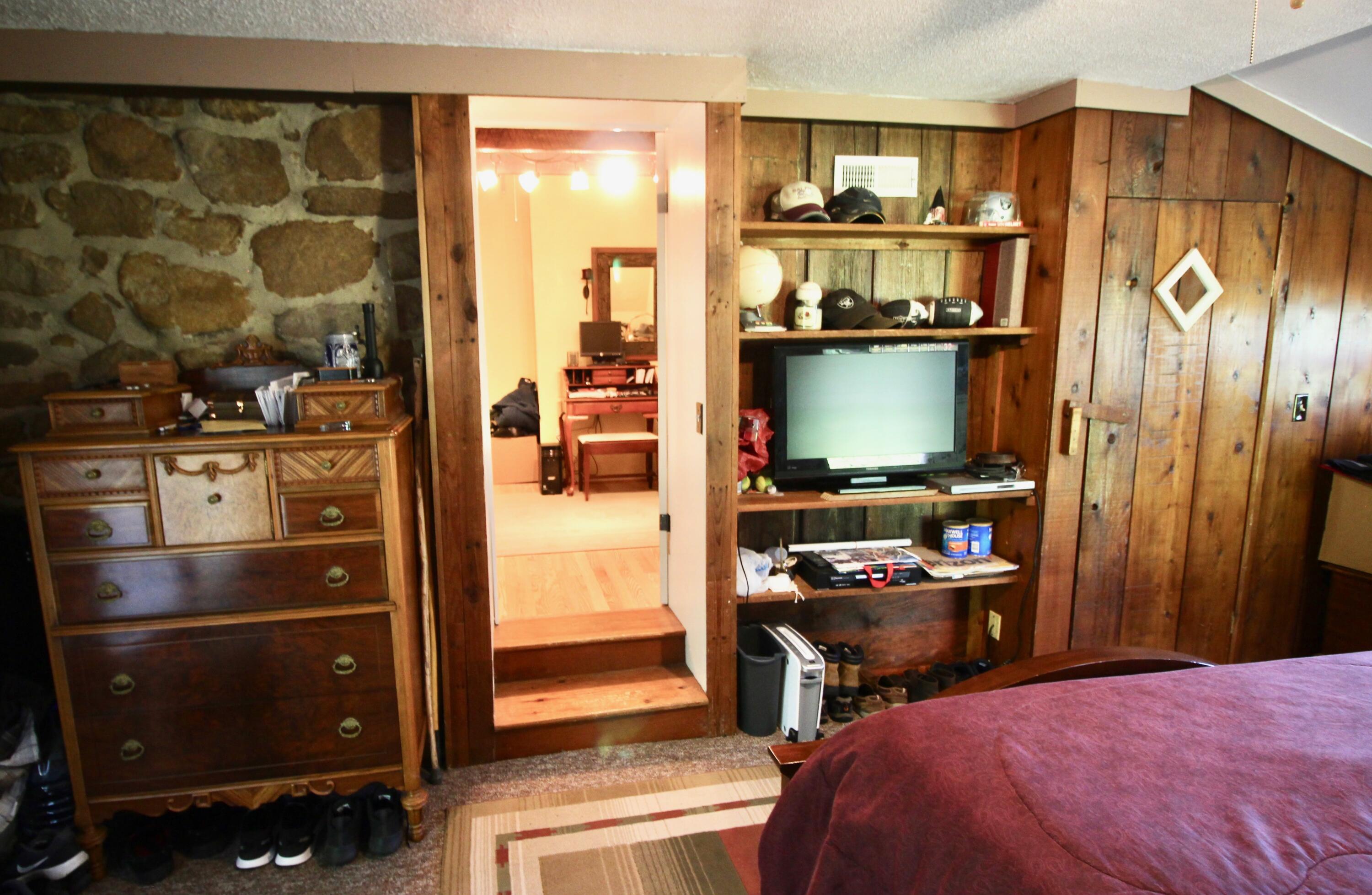 4066 Daugherty Road Salem, VA 24153 - Photo 16 of 23 a bedroom with a bed and a television