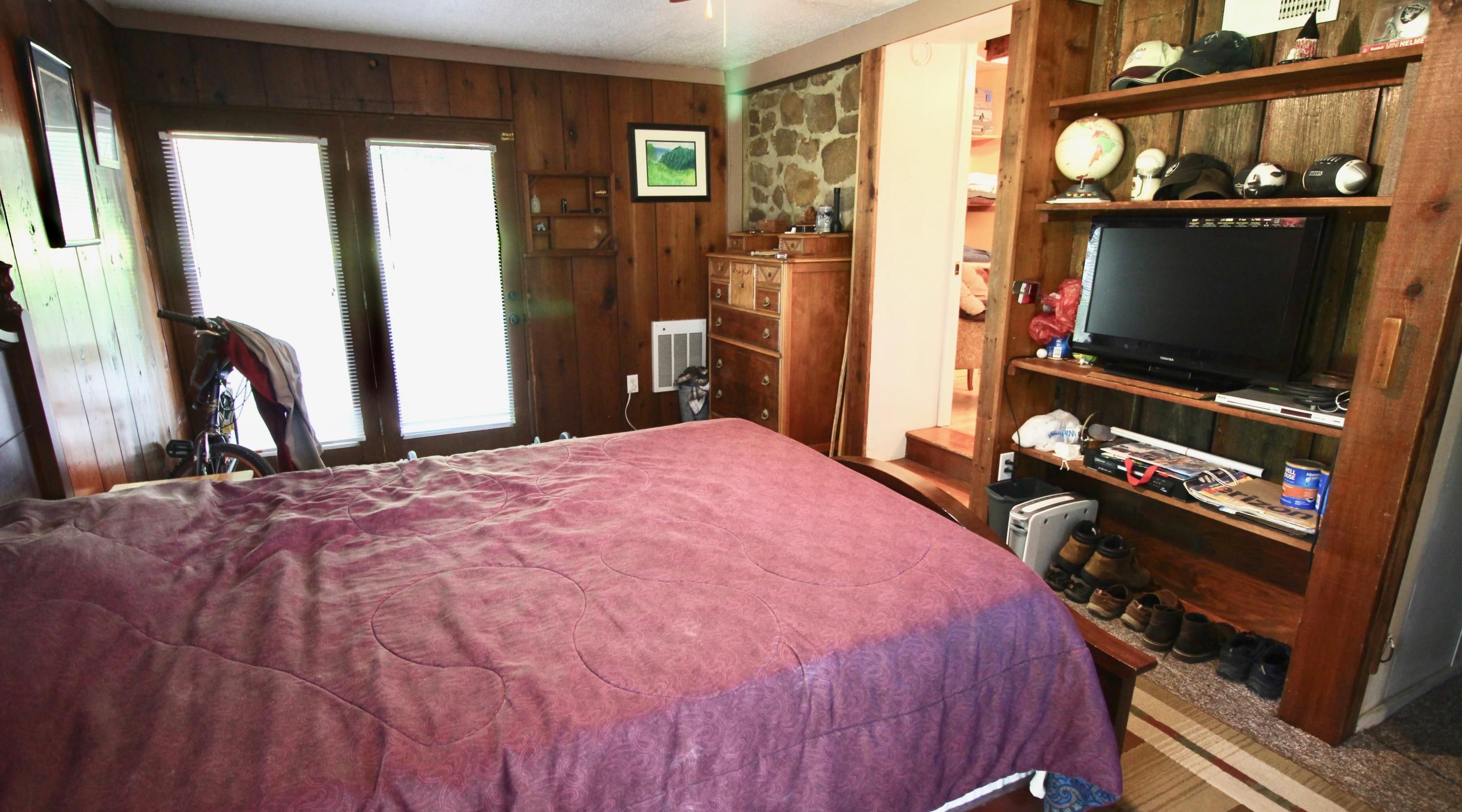 4066 Daugherty Road Salem, VA 24153 - Photo 20 of 23 a bedroom with a bed and flat screen tv
