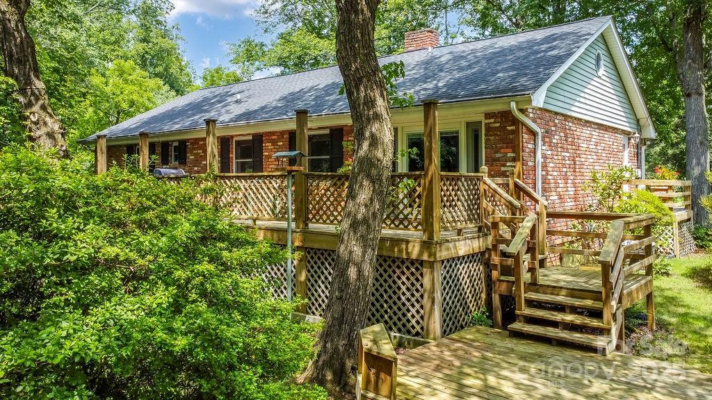 3 Stockwood Road Asheville, NC 28803 - Photo 14 of 36 a view of a house with wooden fence