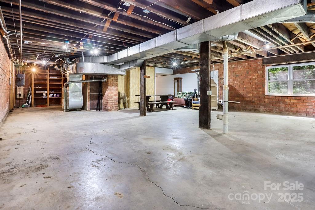 3 Stockwood Road Asheville, NC 28803 - Photo 28 of 36 a view of a room with wooden walls