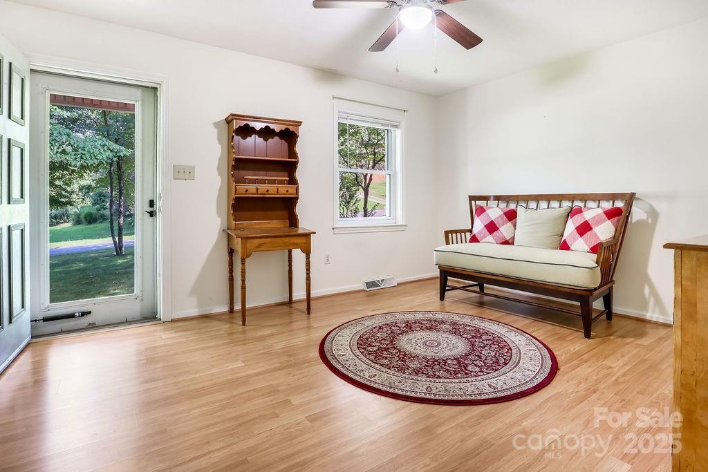 3 Stockwood Road Asheville, NC 28803 - Photo 6 of 36 a living room with furniture and a window