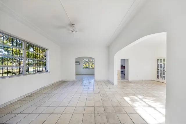 an empty room with windows