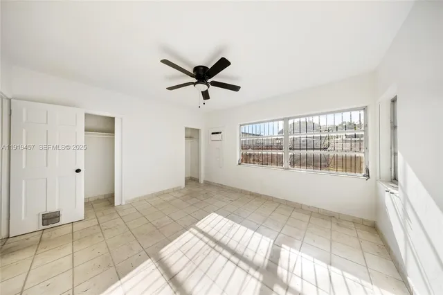 a view of a swimming pool with a yard