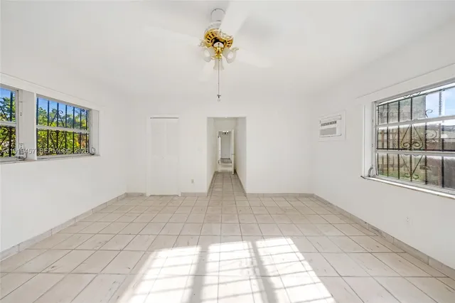 a view of yard with swimming pool and sitting area