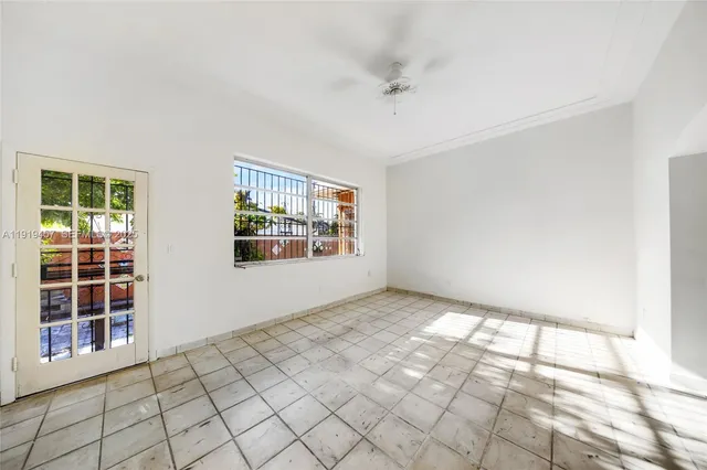 a view of an empty room and window