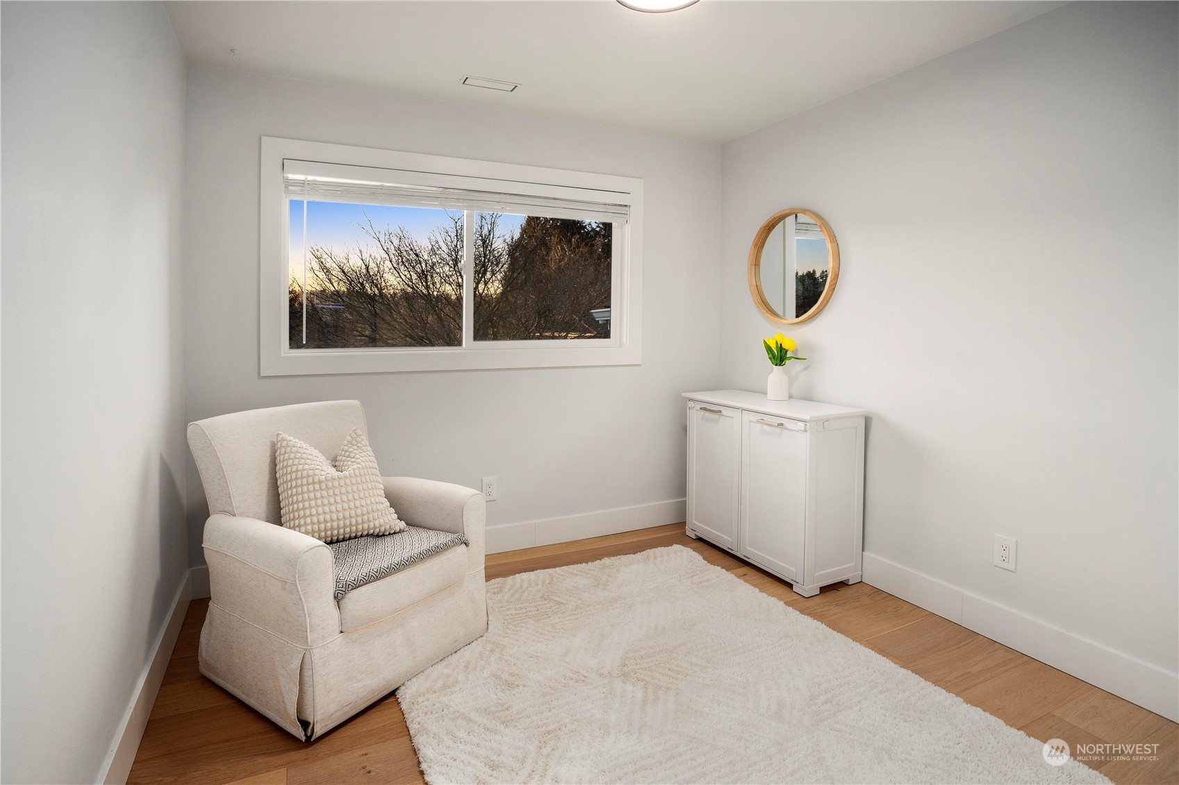 24301 7th Place West Bothell, WA 98021 - Photo 14 of 38 a living room with a couch and a window