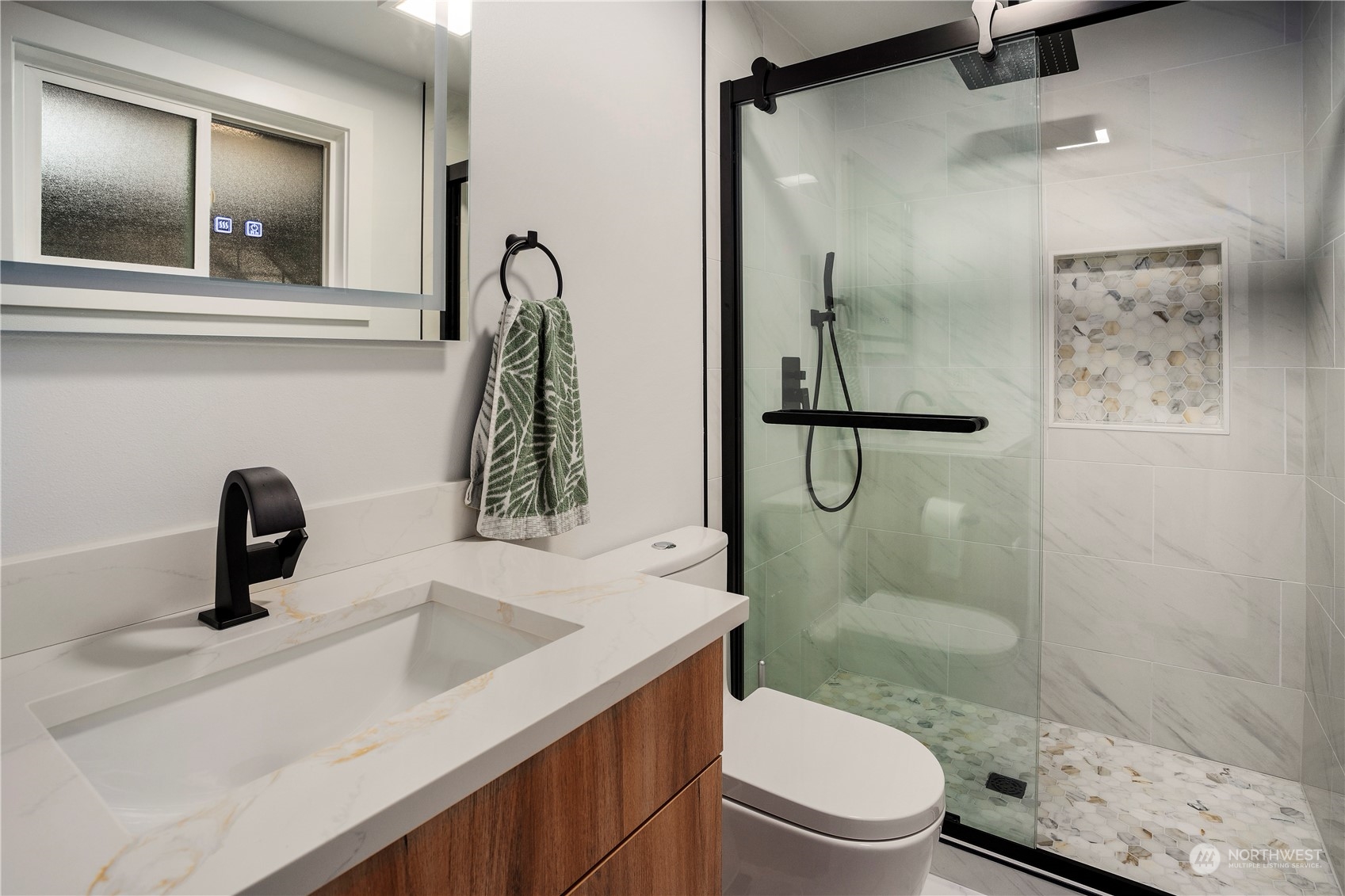 24301 7th Place West Bothell, WA 98021 - Photo 18 of 38 a bathroom with a sink a toilet and shower