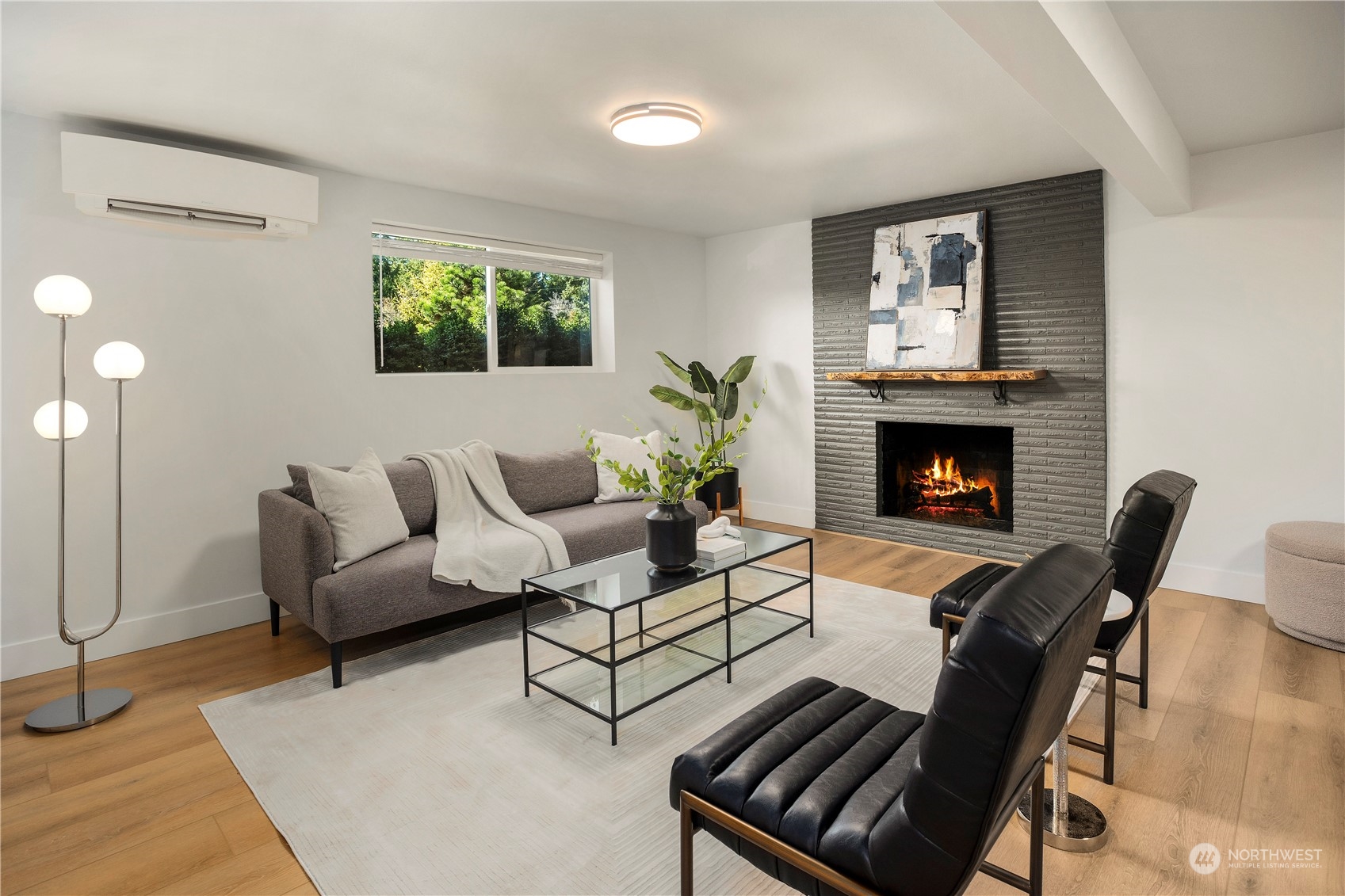 24301 7th Place West Bothell, WA 98021 - Photo 19 of 38 a living room with furniture and a fireplace