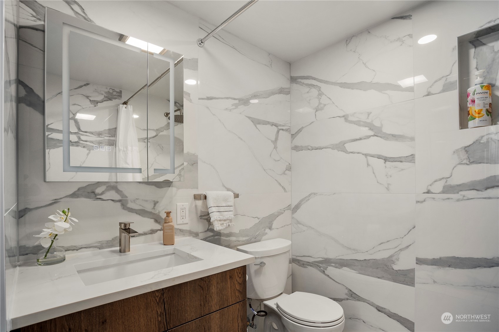 24301 7th Place West Bothell, WA 98021 - Photo 24 of 38 a bathroom with a sink toilet vanity and shower