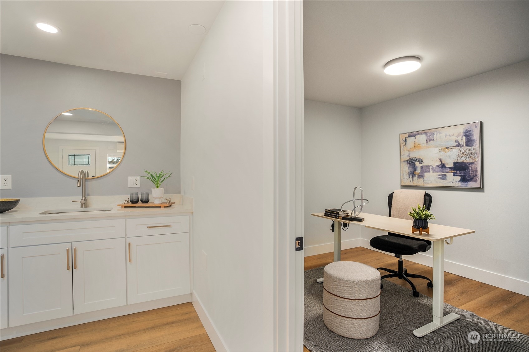 24301 7th Place West Bothell, WA 98021 - Photo 27 of 38 a living room with furniture and a wooden floor
