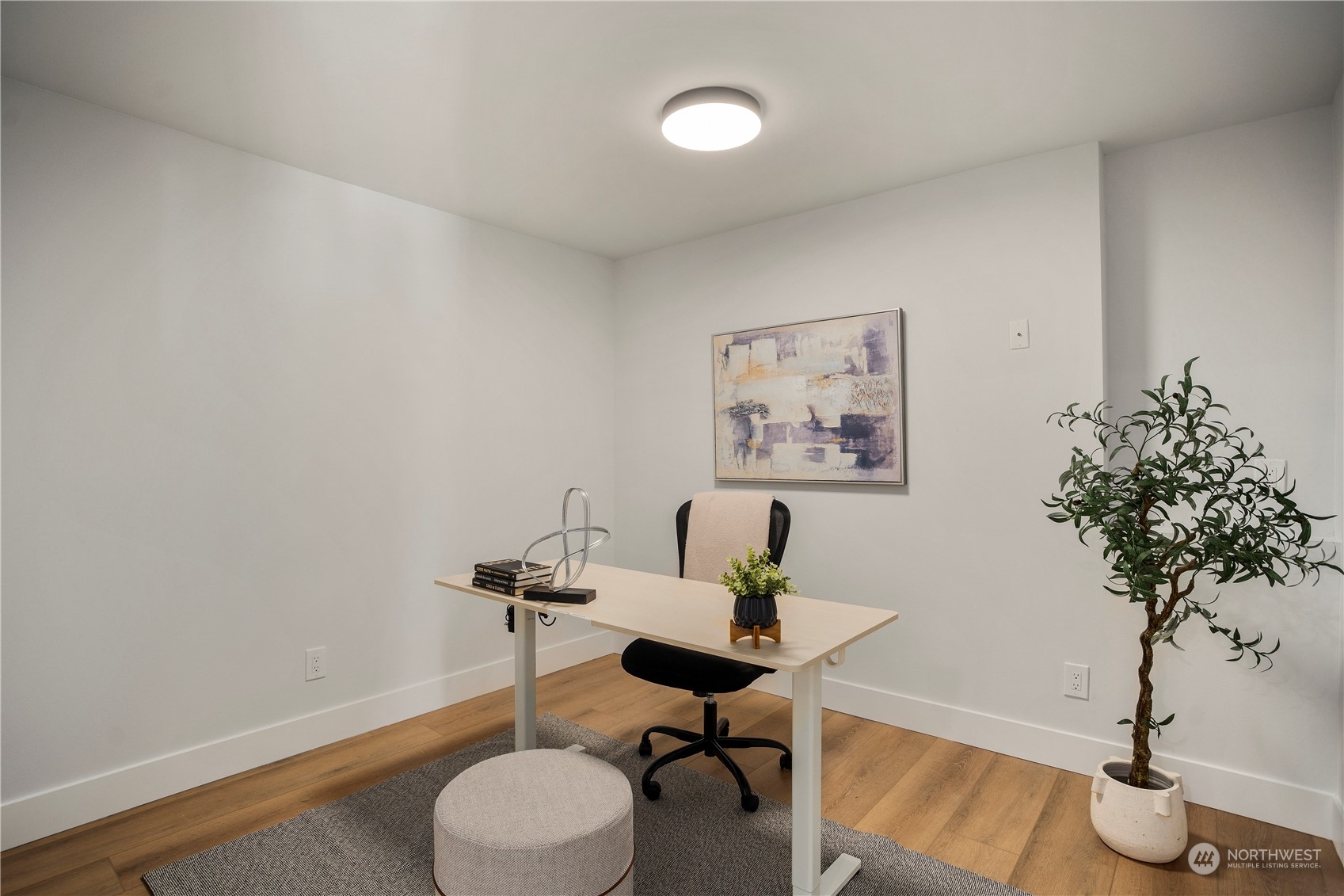 24301 7th Place West Bothell, WA 98021 - Photo 28 of 38 a workspace with furniture and wooden floor