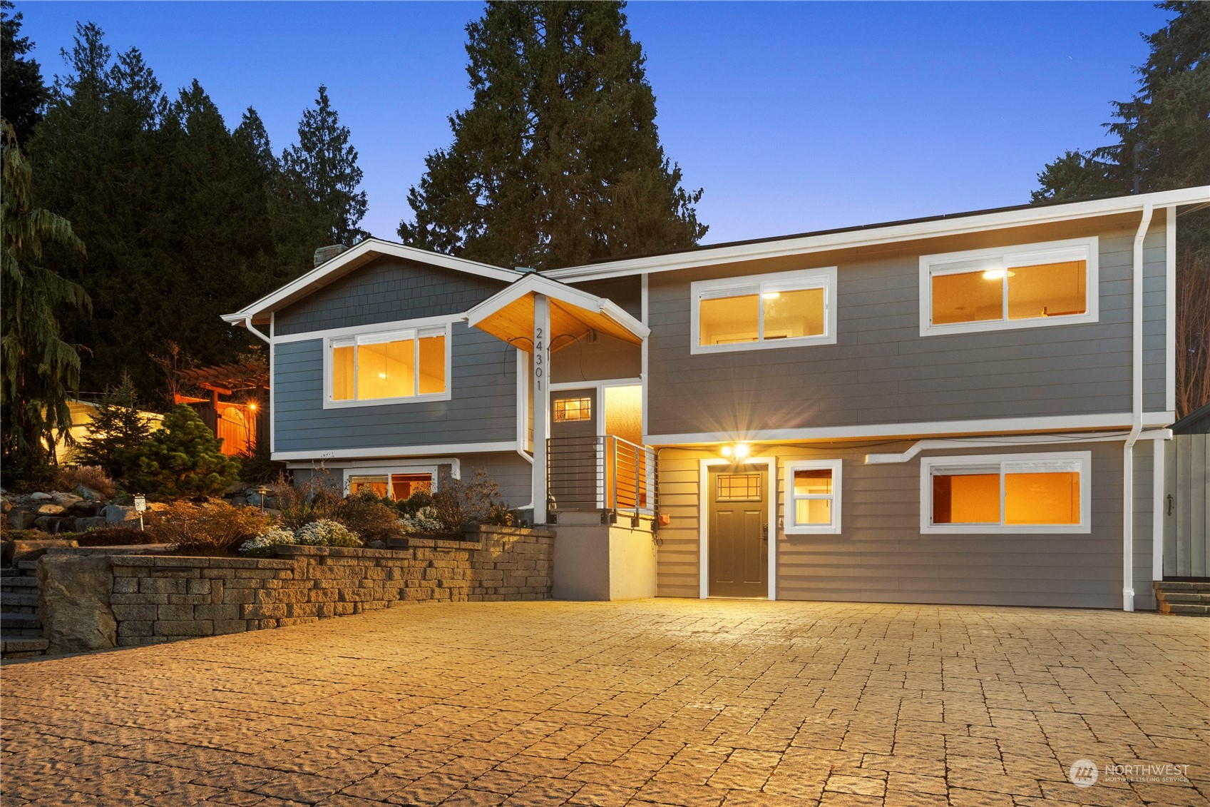 24301 7th Place West Bothell, WA 98021 - Photo 3 of 38 a front view of a house with yard