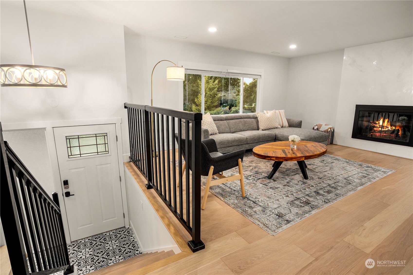 24301 7th Place West Bothell, WA 98021 - Photo 4 of 38 a living room with furniture and a fireplace