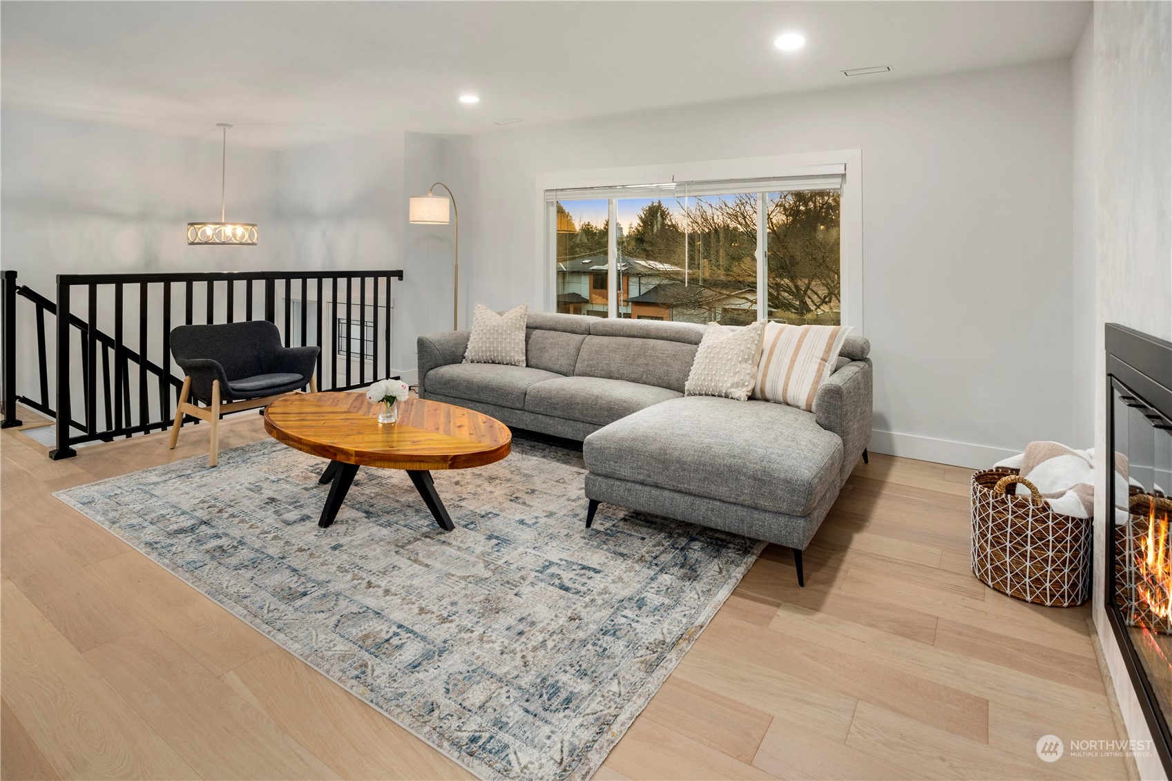 24301 7th Place West Bothell, WA 98021 - Photo 5 of 38 a living room with furniture a rug and a large window