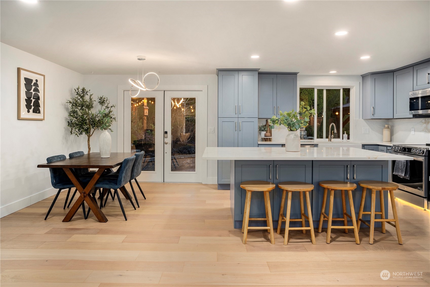 24301 7th Place West Bothell, WA 98021 - Photo 6 of 38 a dining room with furniture a floor to ceiling window and chairs