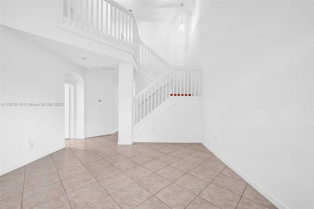 a view of an entryway with white walls