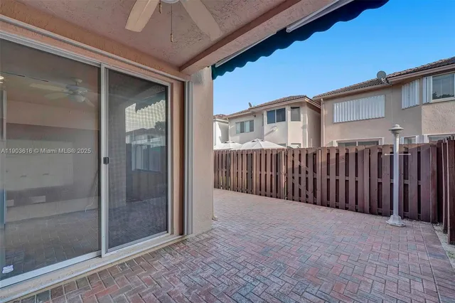 a view of a house with a glass door