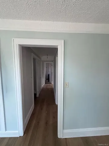 a view of a bedroom from a hallway