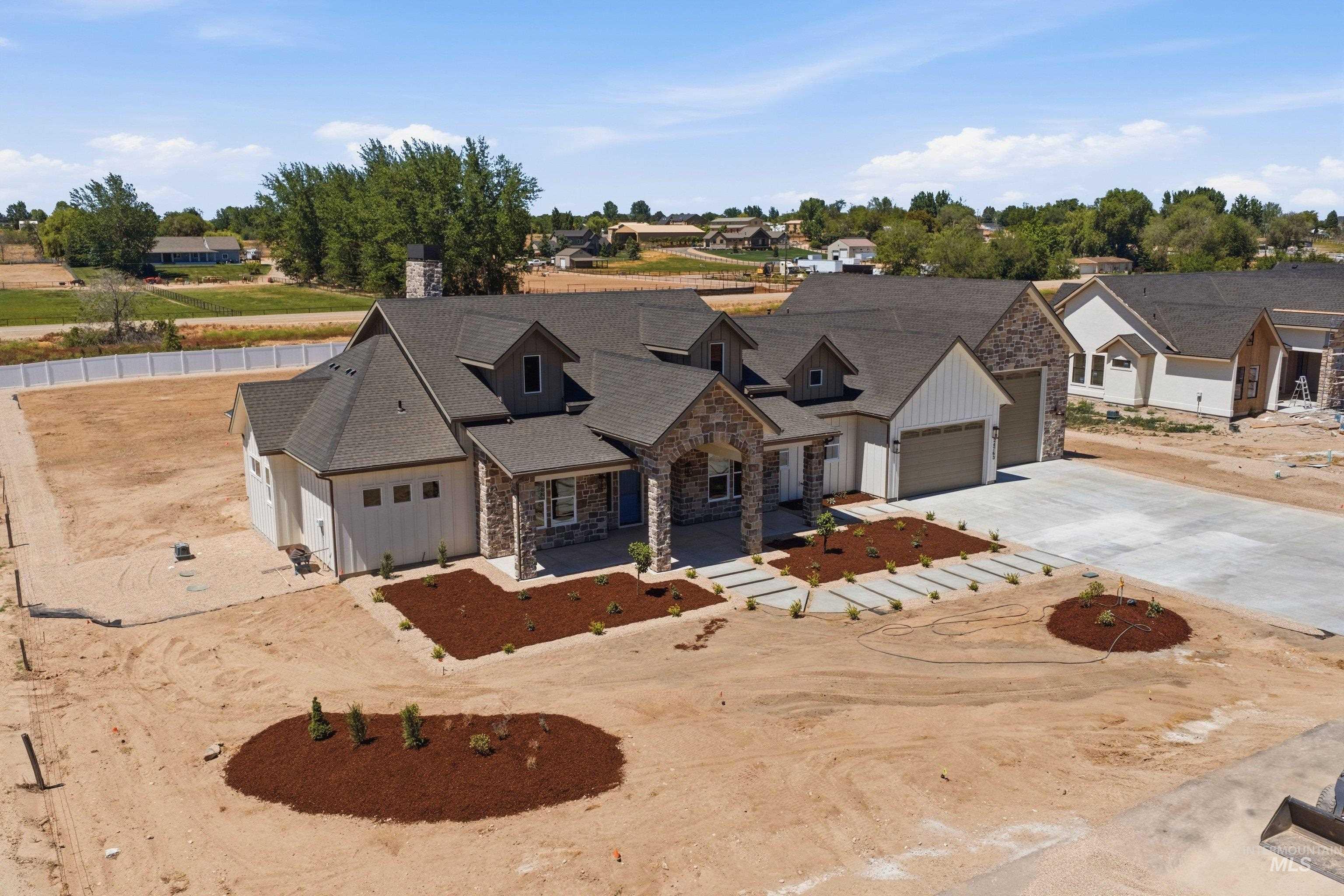 24763 Ardmore Court Caldwell, ID 83607 - Photo 43 of 50 Modern farmhouse-style residence featuring stone and board-and-batten siding