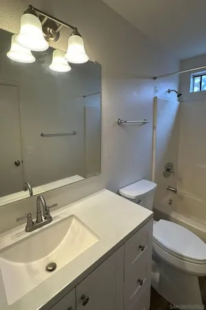 a view of a small space with a fan