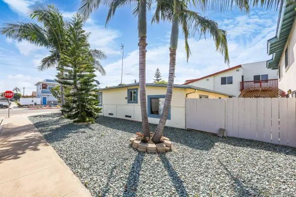 a view of a street with a building in the background