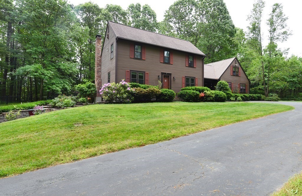 204 Marion Road Middleboro, MA 02346 - Photo 3 of 40 a view of a house with a yard and potted plants