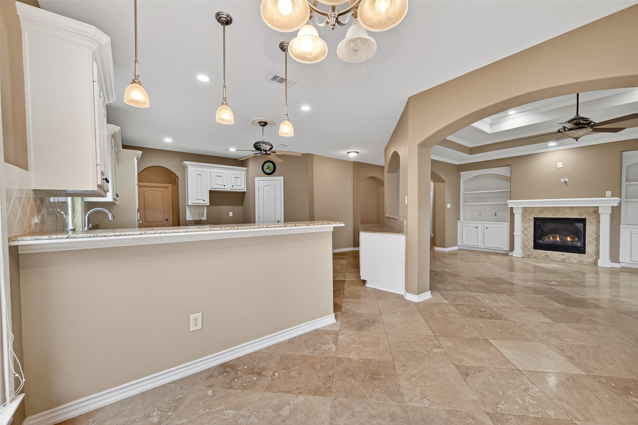 15 Wick Willow Road Montgomery, TX 77356 - Photo 14 of 49 a large room with a large window and chandelier