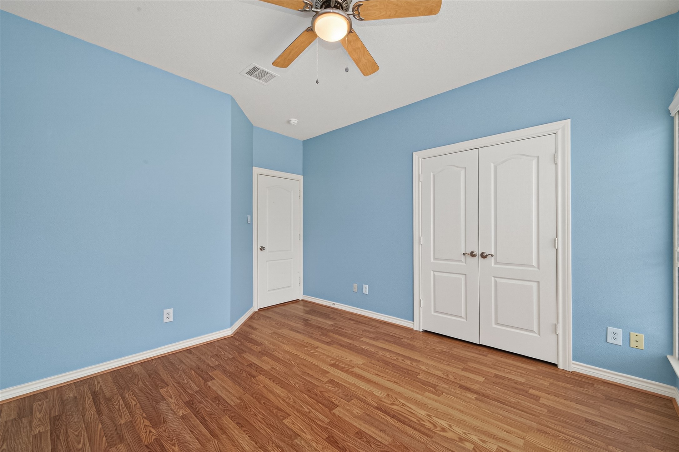 15 Wick Willow Road Montgomery, TX 77356 - Photo 33 of 49 wooden floor in an empty room with a window