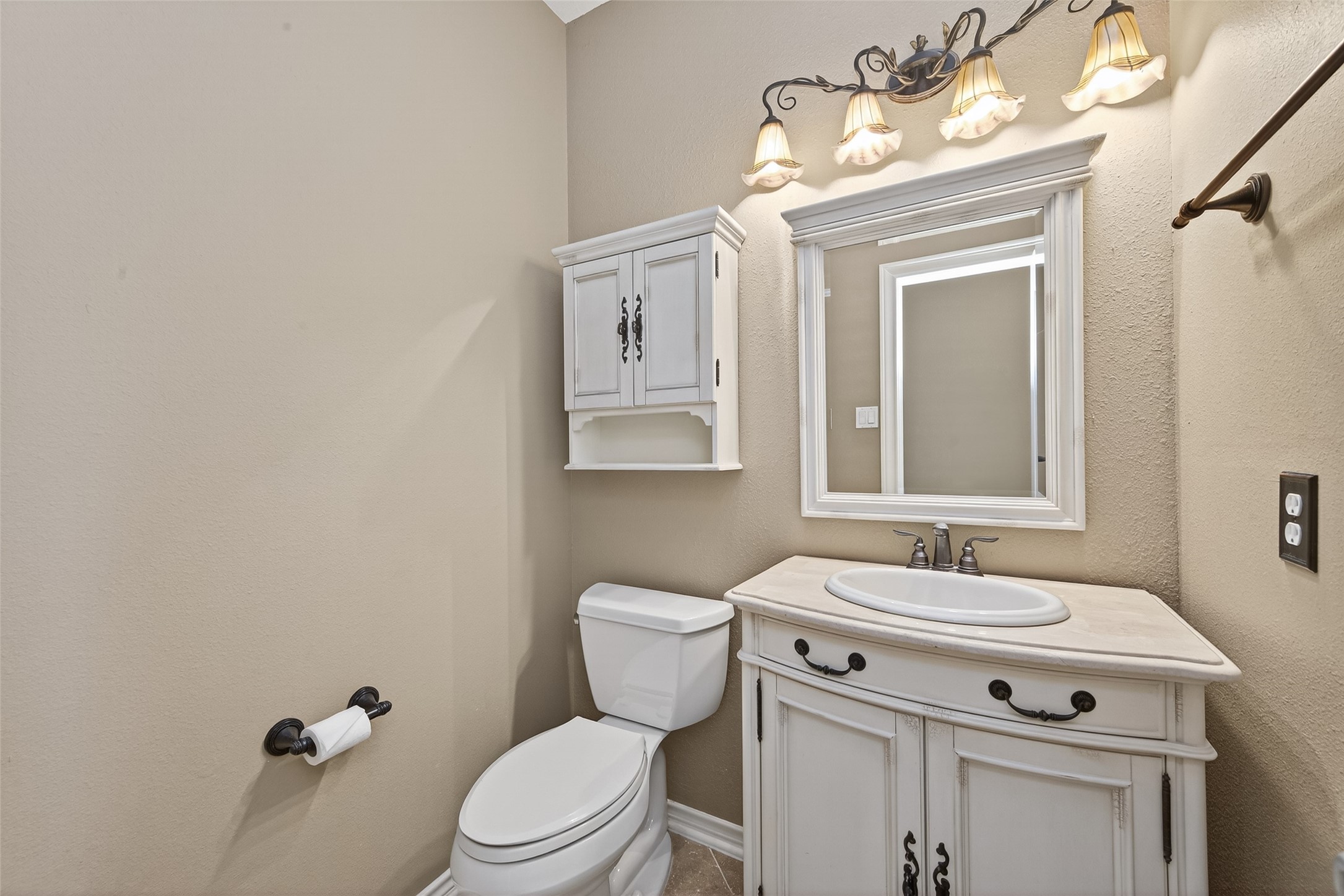 15 Wick Willow Road Montgomery, TX 77356 - Photo 38 of 49 a bathroom with a sink a toilet and mirror