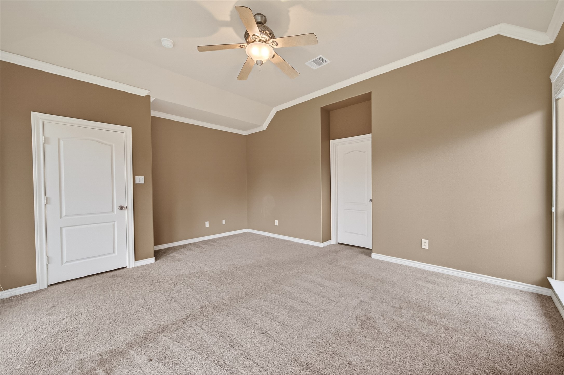 15 Wick Willow Road Montgomery, TX 77356 - Photo 41 of 49 a view of an empty room with a ceiling fan