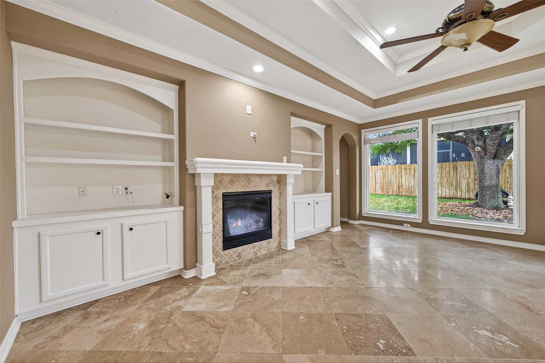 15 Wick Willow Road Montgomery, TX 77356 - Photo 10 of 49 a view of an empty room with a fireplace and a window