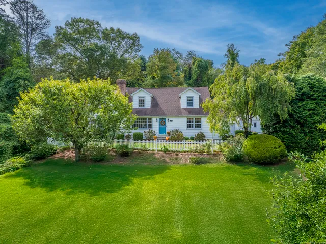 a view of a house with a big yard