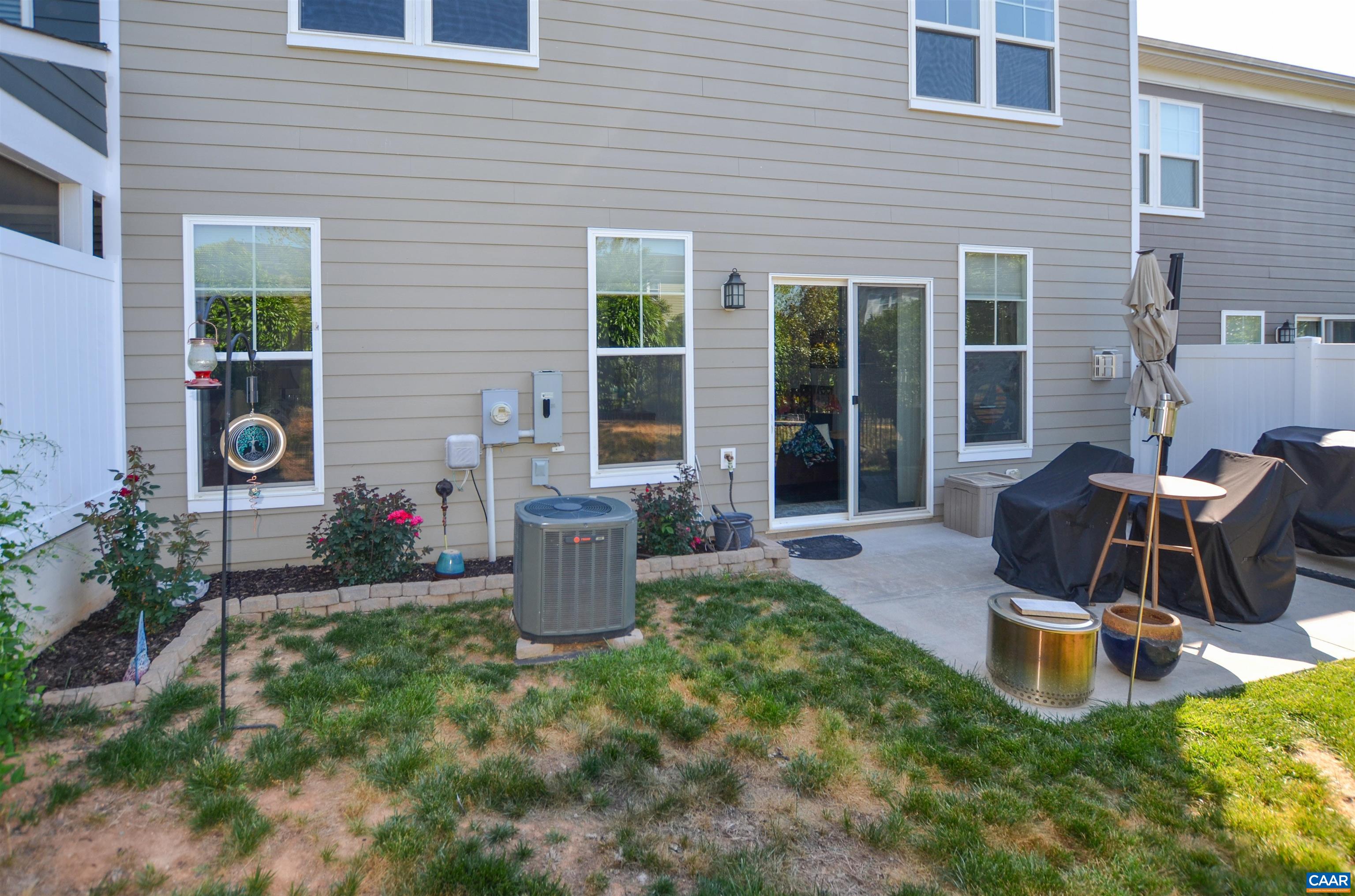 327 Claibourne Road Crozet, VA 22932 - Photo 33 of 36 a view of a house with backyard sitting area and garden